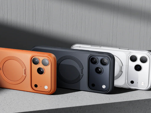 MagSafe-compatible phone cases in orange, black, gray, and clear finishes displayed side by side