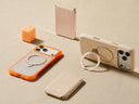 Torras orange and beige MagSafe iPhone cases with ring stands, power bank, charger and wallet