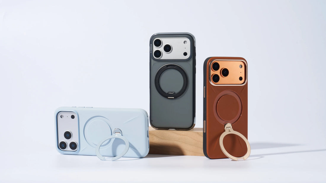 Three TORRAS phone cases with built-in ring stands displayed in blue, gray, and brown