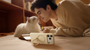 Cozy home: man nuzzling Ragdoll cat with beige iPhone stand case