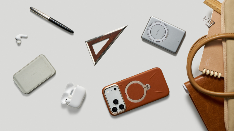 Flat lay of phone accessories with a ring stand case and magnetic power bank