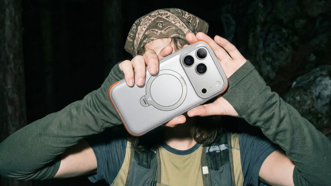 TORRAS phone case with circular kickstand held outdoors during a hiking trip