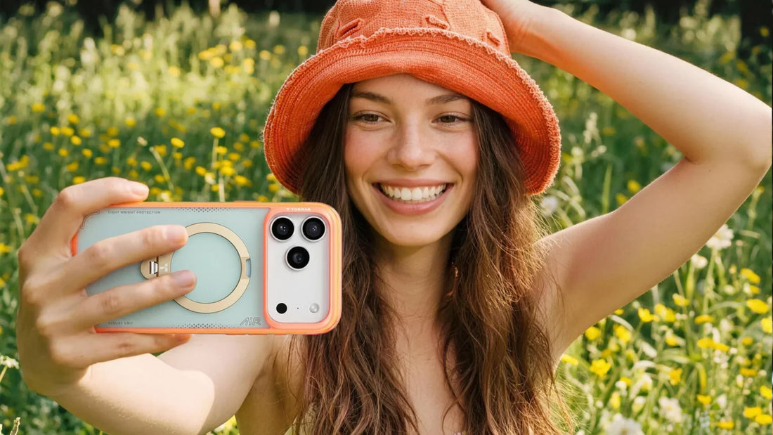 Woman taking a selfie outdoors with a TORRAS phone case featuring a circular ring design