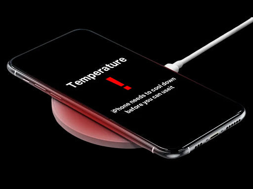 iPhone overheating warning shown on screen while charging on a wireless charger