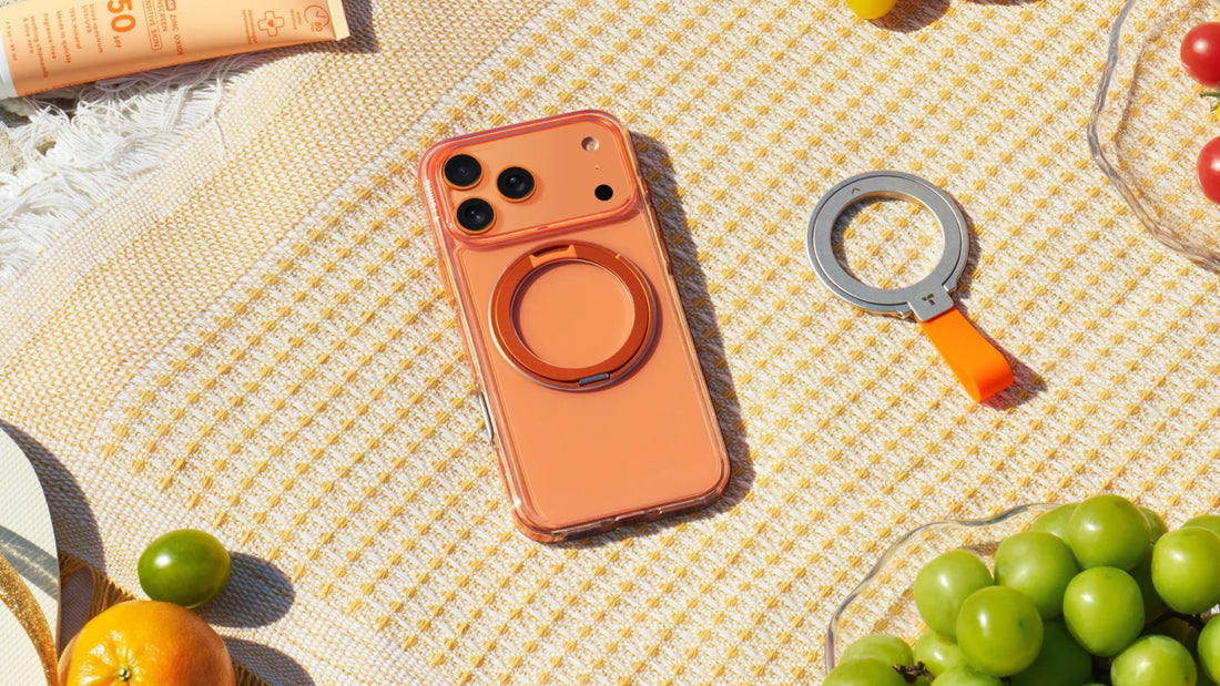 Orange ring stand case beside a magnifier for close inspection