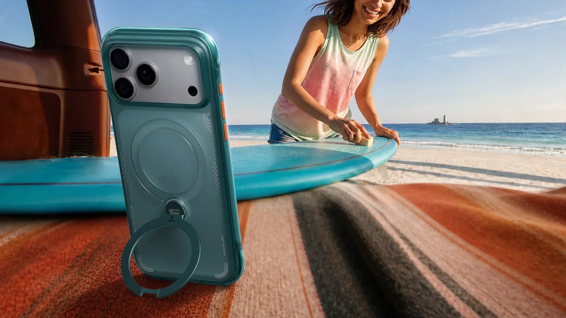 Phone on a stand filming a person walking with a surfboard