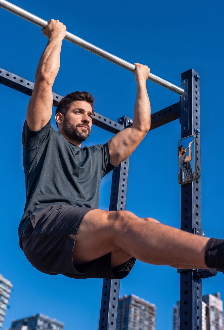 Man training on a pull-up bar outdoors